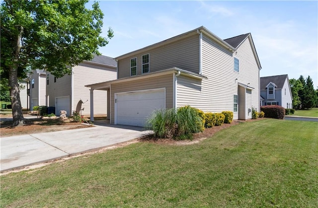 3223 Tallon Ln SW, Atlanta, GA 30311 - view of home's exterior featuring an attached garage, driveway, and a yard