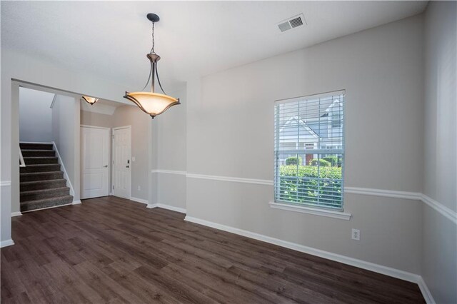 3223 Tallon Ln SW, Atlanta, GA 30311 - spare room with dark wood finished floors, stairs, and baseboards