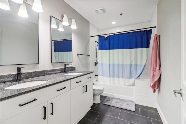 full bathroom with vanity, shower / bath combination with curtain, toilet, and tile patterned flooring