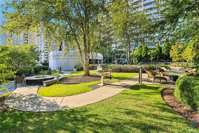 view of home's community featuring a lawn