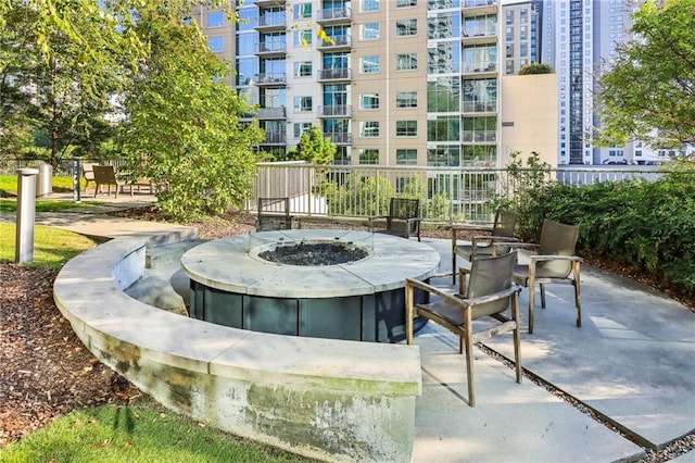 view of home's community with a fire pit