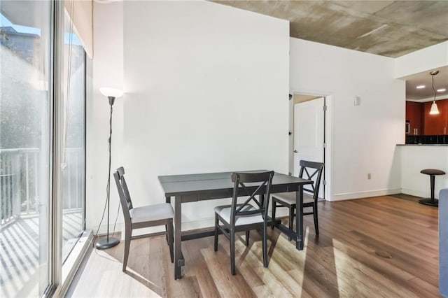 dining area featuring light wood-type flooring