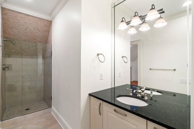 bathroom featuring crown molding, vanity, tile patterned floors, and a shower with shower door