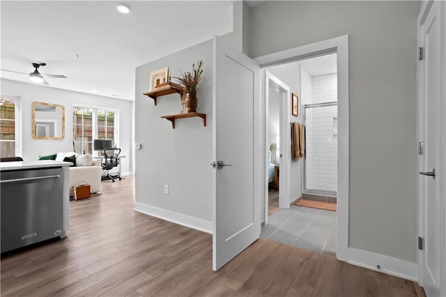 hallway with light wood-type flooring