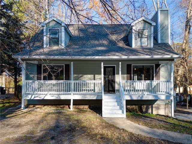 cape cod home with covered porch