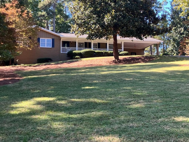 view of yard with covered porch