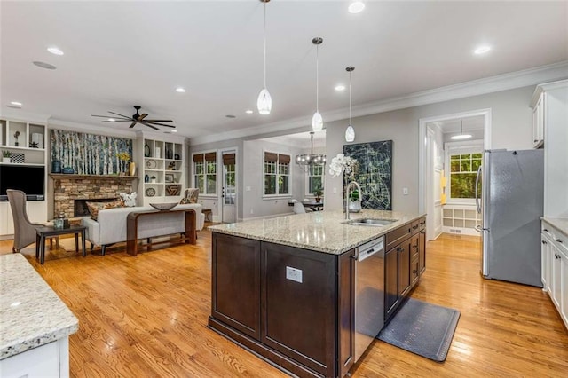504 S Westminster Way NE, Atlanta, GA 30307 - kitchen featuring a sink, appliances with stainless steel finishes, a ceiling fan, ornamental molding, and white cabinetry