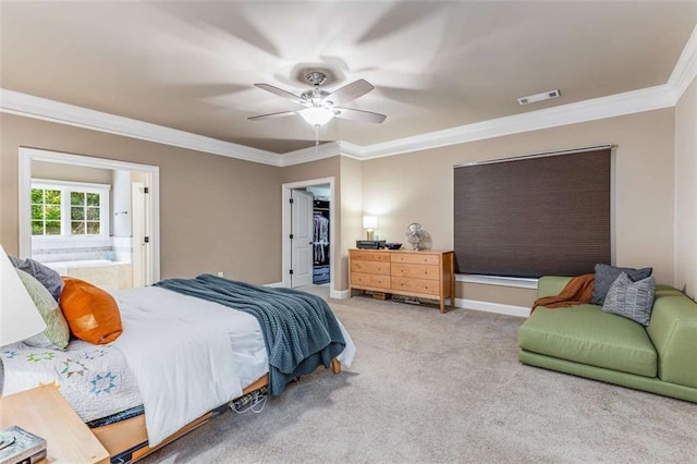 504 S Westminster Way NE, Atlanta, GA 30307 - carpeted bedroom featuring crown molding, a ceiling fan, baseboards, a walk in closet, and ensuite bath