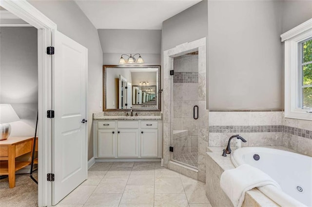 504 S Westminster Way NE, Atlanta, GA 30307 - bathroom with vanity, a jetted tub, and a stall shower