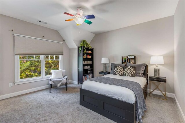 504 S Westminster Way NE, Atlanta, GA 30307 - bedroom with baseboards, carpet flooring, a ceiling fan, and vaulted ceiling