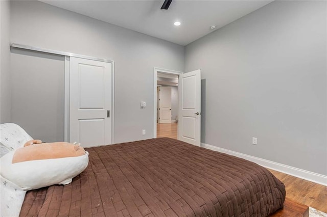 504 S Westminster Way NE, Atlanta, GA 30307 - bedroom with wood finished floors, a closet, baseboards, recessed lighting, and ceiling fan