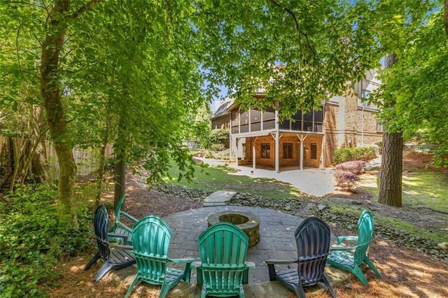 504 S Westminster Way NE, Atlanta, GA 30307 - view of yard with a fire pit, a patio, and a sunroom