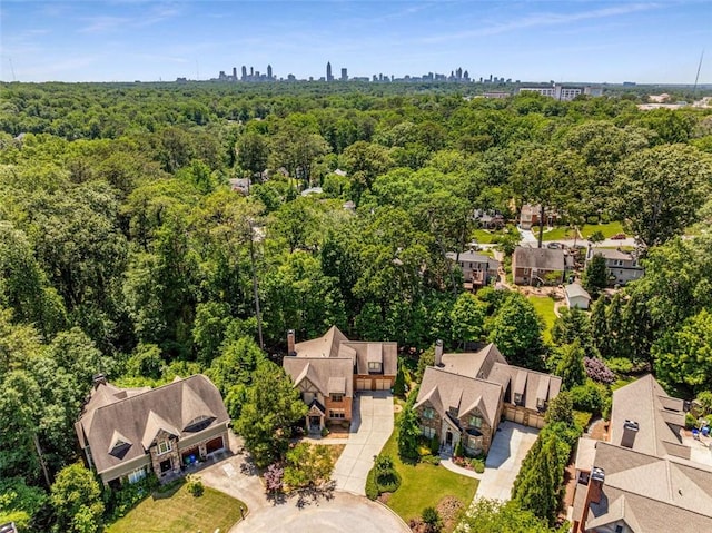 504 S Westminster Way NE, Atlanta, GA 30307 - aerial perspective of suburban area featuring a forest and city skyline