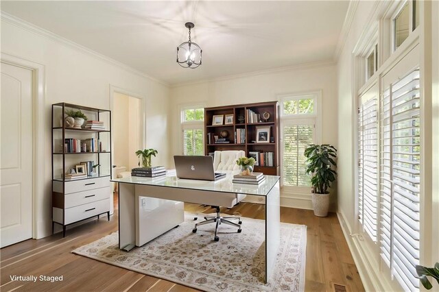 1632 Brookhaven Close NE, Brookhaven, GA 30319 - office space featuring wood finished floors, ornamental molding, and a chandelier