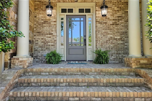 1632 Brookhaven Close NE, Brookhaven, GA 30319 - doorway to property featuring brick siding and a porch