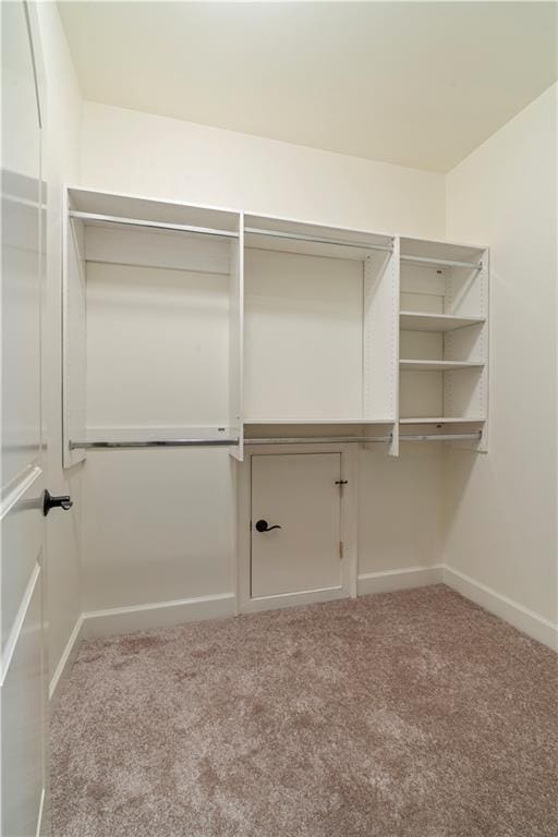 1632 Brookhaven Close NE, Brookhaven, GA 30319 - spacious closet featuring carpet floors