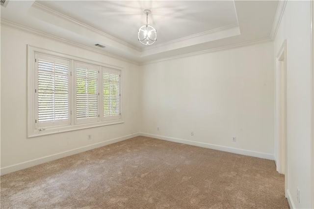 1632 Brookhaven Close NE, Brookhaven, GA 30319 - spare room featuring crown molding, carpet, a tray ceiling, baseboards, and a chandelier