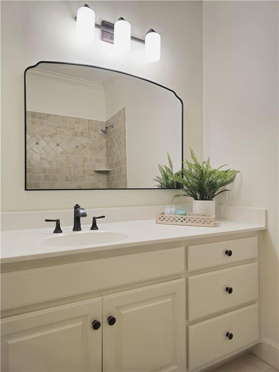 1632 Brookhaven Close NE, Brookhaven, GA 30319 - full bathroom featuring vanity and tiled shower