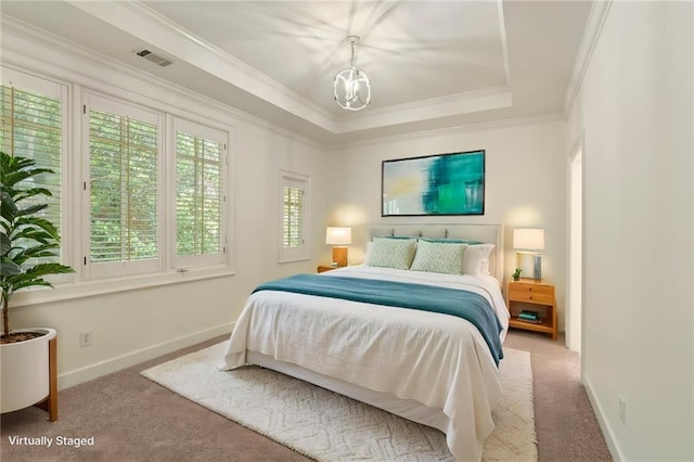 1632 Brookhaven Close NE, Brookhaven, GA 30319 - carpeted bedroom with a chandelier, baseboards, ornamental molding, and a tray ceiling