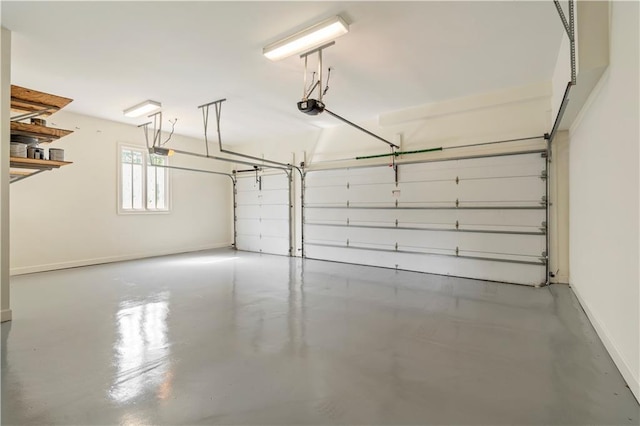 1632 Brookhaven Close NE, Brookhaven, GA 30319 - garage with a garage door opener and baseboards