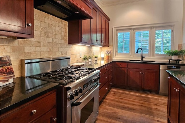 1632 Brookhaven Close NE, Brookhaven, GA 30319 - kitchen with appliances with stainless steel finishes, a sink, exhaust hood, decorative backsplash, and ornamental molding