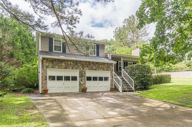 4411 Westerling Ct, Powder Springs, GA 30127 - view of front of property with stone siding, an attached garage, concrete driveway, and stairway