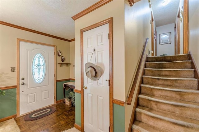 4411 Westerling Ct, Powder Springs, GA 30127 - foyer entrance with a textured ceiling, stairs, and ornamental molding