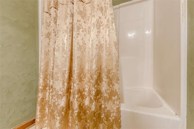 4411 Westerling Ct, Powder Springs, GA 30127 - full bathroom featuring shower / tub combo