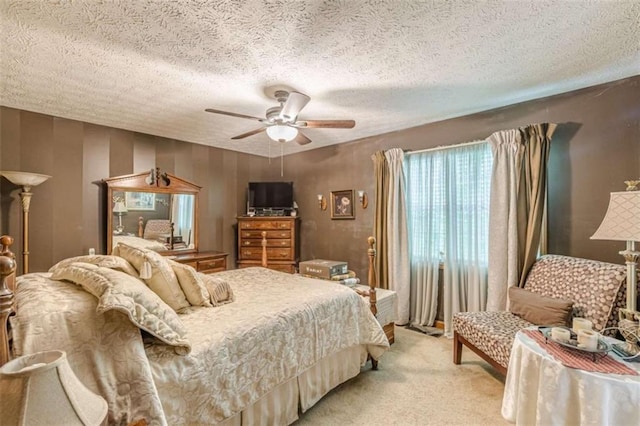 4411 Westerling Ct, Powder Springs, GA 30127 - bedroom featuring light carpet, a textured ceiling, and a ceiling fan