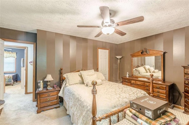 4411 Westerling Ct, Powder Springs, GA 30127 - bedroom featuring a textured ceiling, light carpet, ceiling fan, and wallpapered walls