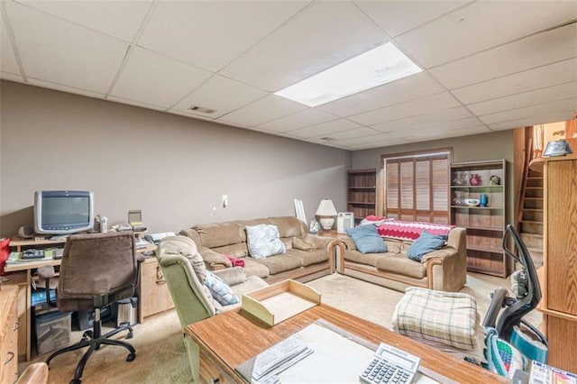 4411 Westerling Ct, Powder Springs, GA 30127 - living area featuring carpet floors, a drop ceiling, a desk, and stairs