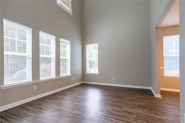 4567 Parkway Cir, Atlanta, GA 30349 - unfurnished bedroom featuring carpet, a closet, a ceiling fan, and baseboards