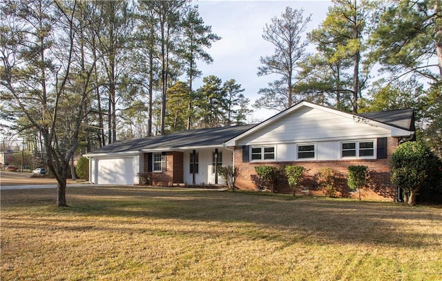 single story home featuring a garage, brick siding, and a front yard