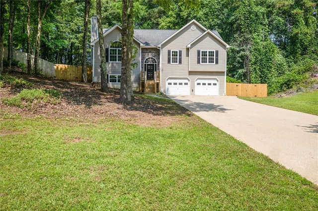 232 Barrett Springs Way, Canton, GA 30115 - split foyer home featuring driveway, a chimney, and an attached garage