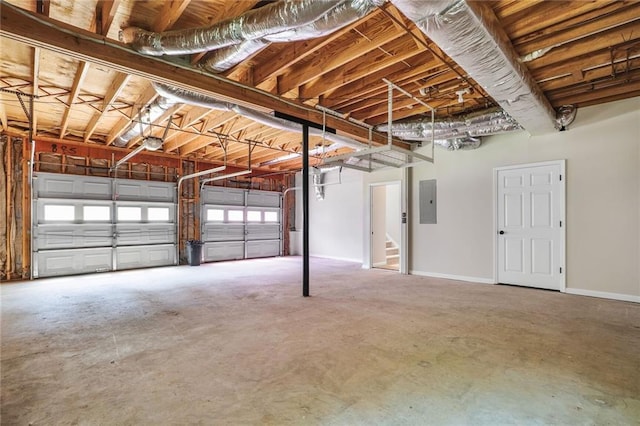 232 Barrett Springs Way, Canton, GA 30115 - garage with electric panel, baseboards, and a garage door opener