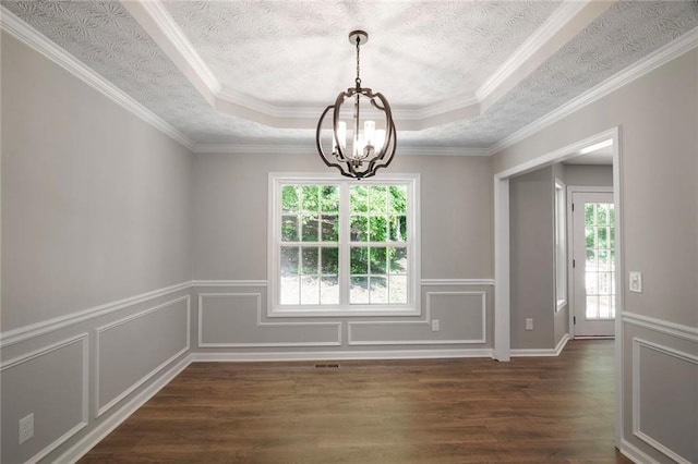 232 Barrett Springs Way, Canton, GA 30115 - spare room with healthy amount of natural light, a chandelier, dark wood-style flooring, a textured ceiling, and a raised ceiling