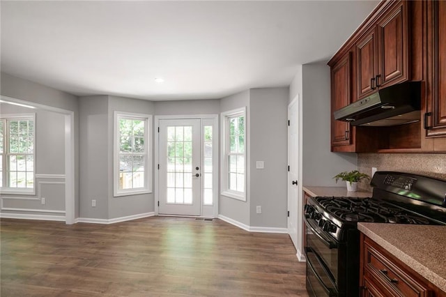 232 Barrett Springs Way, Canton, GA 30115 - kitchen featuring black gas range oven, under cabinet range hood, baseboards, dark wood-type flooring, and recessed lighting