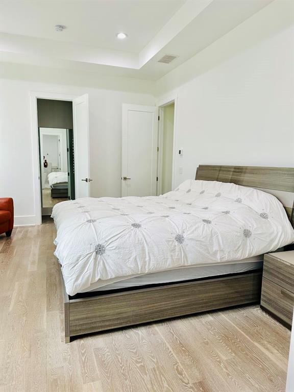 2964 Old Peachtree Rd, Dacula, GA 30019 - bedroom featuring recessed lighting, baseboards, visible vents, and light wood-style floors