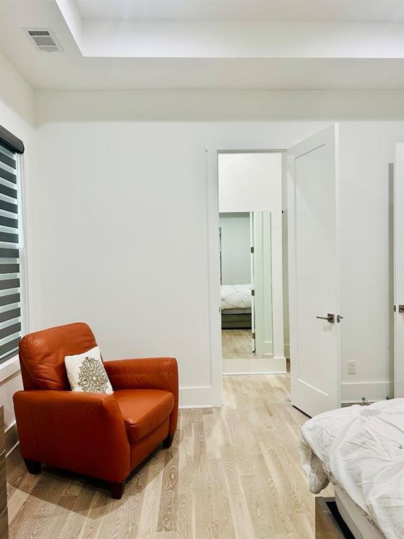 2964 Old Peachtree Rd, Dacula, GA 30019 - bedroom with baseboards, visible vents, and light wood-type flooring
