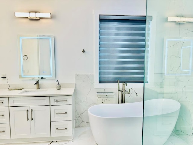 2964 Old Peachtree Rd, Dacula, GA 30019 - full bath with tile walls, a soaking tub, marble finish floor, and vanity