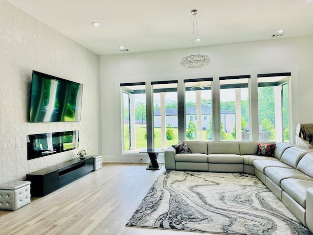 2964 Old Peachtree Rd, Dacula, GA 30019 - living room with recessed lighting, wood finished floors, and a wealth of natural light