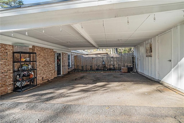 exterior space with a carport