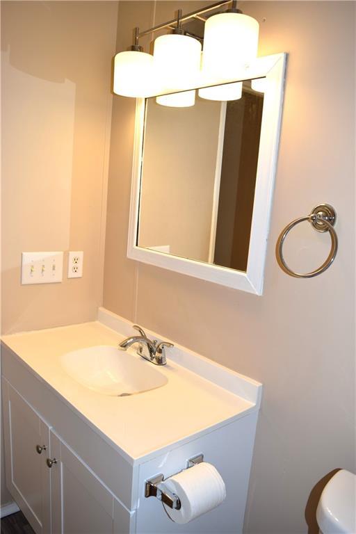 59 Pine Ridge Ln, White, GA 30184 - bathroom featuring vanity and toilet