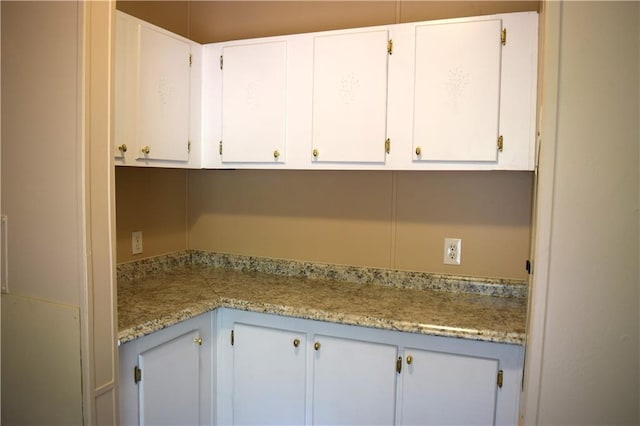 59 Pine Ridge Ln, White, GA 30184 - kitchen featuring light countertops and white cabinets