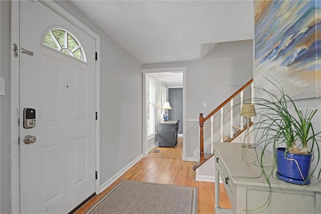 9470 Hillside Dr, Roswell, GA 30076 - entryway featuring light wood-style floors and stairway