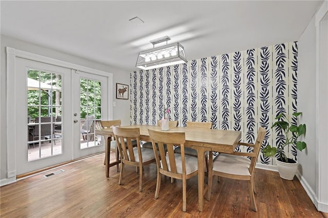 9470 Hillside Dr, Roswell, GA 30076 - dining space with french doors and wood finished floors