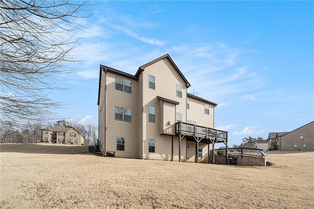 rear view of property with a deck