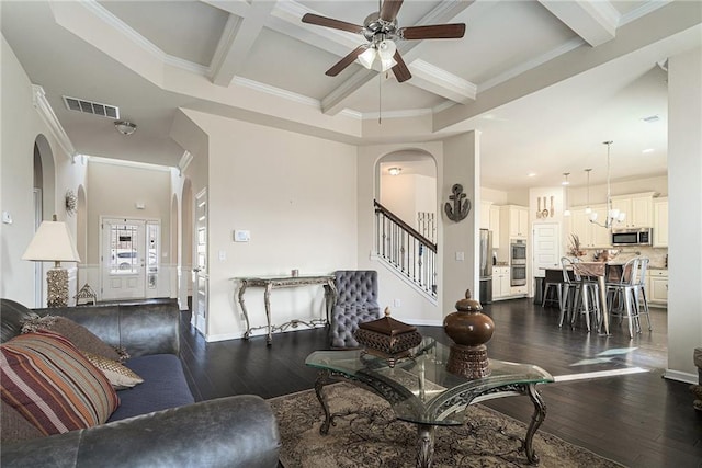 living room with dark wood-type flooring, beam ceiling, crown molding, ceiling fan, and coffered ceiling