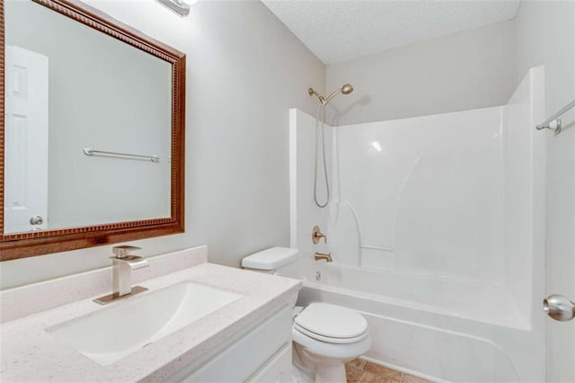 1227 Casper Ln, Winder, GA 30680 - bathroom featuring toilet, shower / tub combination, vanity, and a textured ceiling