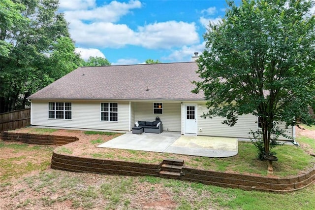 1227 Casper Ln, Winder, GA 30680 - rear view of house with a patio area